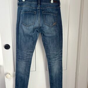 Embroidered Blue Denim Pocket with Tan Stitching

Express super skinny 6regular